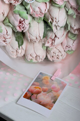Bouquet of marshmallows. Marshmallow flowers. Marshmallow tulips. Homemade marshmallows. Greeting card with place for text. Close-up.