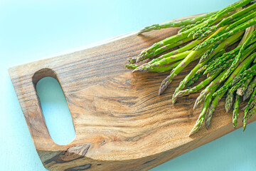 asparagus on a wooden board.