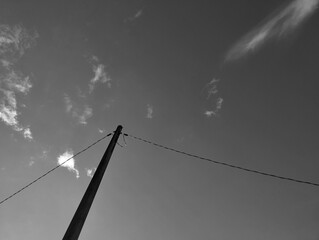 Electric pole and wires under the sky