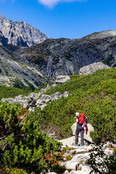 Woman is hiking hight tatra, T&eacute;ryho chate, Terry H&uuml;tte, Slovakia