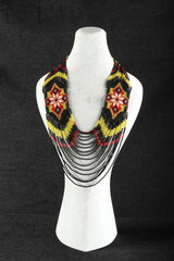 women's necklace made of colorful beads - 768638082
