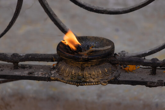 Prayer candle(Diyo) is lit by the devotees in temple, stupas as well as churches as a way of worshipping their god and goddess