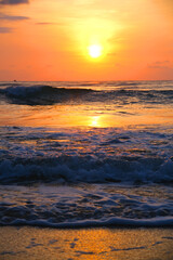 Fototapeta na wymiar Beautiful view of sunrise at the beach in Asia