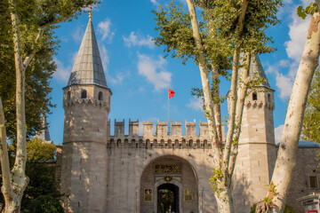 The main entrance gate of Topkapi Palace from the outside. and view of the towers.