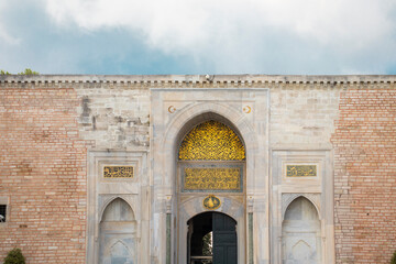 Fototapeta na wymiar The main entrance gate of Topkapi Palace from the outside.
