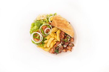 Greek Cypriot Pork Souvlaki - Pork Chopped into bite-sized chunks with salad and chips