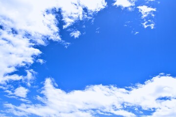 Naklejka na ściany i meble Blue sky with fluffy clouds close up. Sky cloud clear, Landscape concept summer