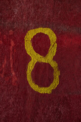 number eight 8 painted on wooden plank