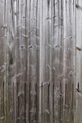 Closeup of old plank wood wall texture background.