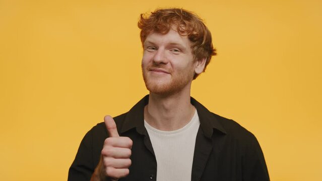Man with Thumbs Up on Yellow Background