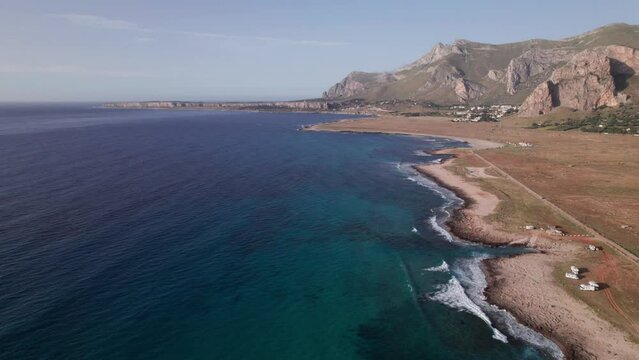 Aerial view drone of sea cost. Flying over the sea surrounded by mountains