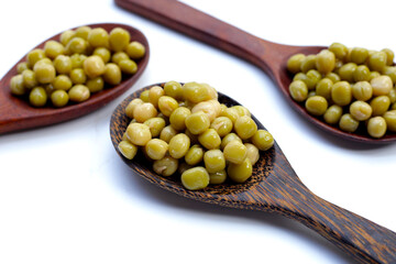 Canned green peas on white background.