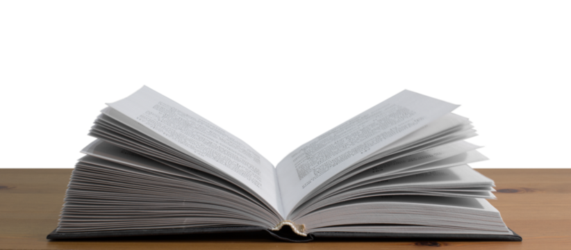 Open book on a wooden table, transparent PNG.