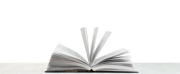 Open book on a wooden table, transparent PNG.