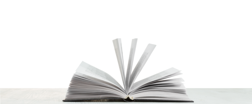 Open book on a wooden table, transparent PNG.