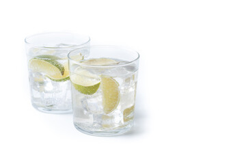 Glass of vodka tonic cocktail isolated on white background. Copy space