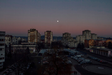 Four stunning architectural images captured in various weather conditions and seasons. Experience the beauty of these buildings under sunny skies, snowfall, rain, and autumn leaves.