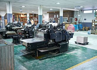 Industrial, printer and machinery in printing, factory and industry for newspaper, magazine and...