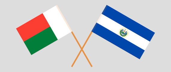 Crossed flags of Madagascar and El Salvador. Official colors. Correct proportion