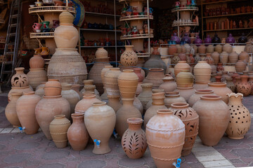 Fototapeta na wymiar Various pottery industries in Nizwa Market, Nizwa City, Sultanate of Oman, ‎February ‎3, ‎2024 .