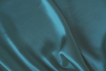 elegant delicate silk texture in turquoise pastel color with soft, gentle folds, design concept,...