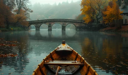 Foto auf Alu-Dibond Rakotzbrücke Boat floats on river with bridge in the background.