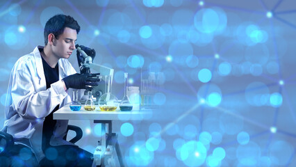 Man laboratory assistant. Guy with microscope. Laboratory technician conducts research. Scientist...