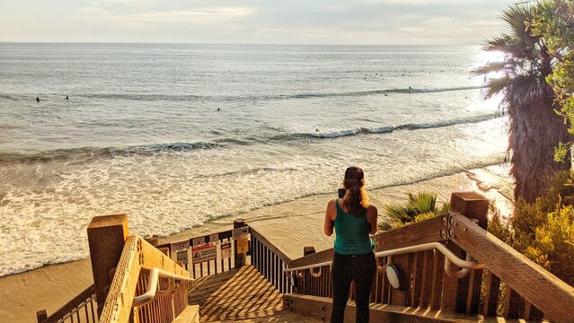 A mix of Southern California beach scenes with sunsets, surfers, tide pools and palms trees at Swamis Reef Surf Park and Moonlight Beach in Encinitas California.