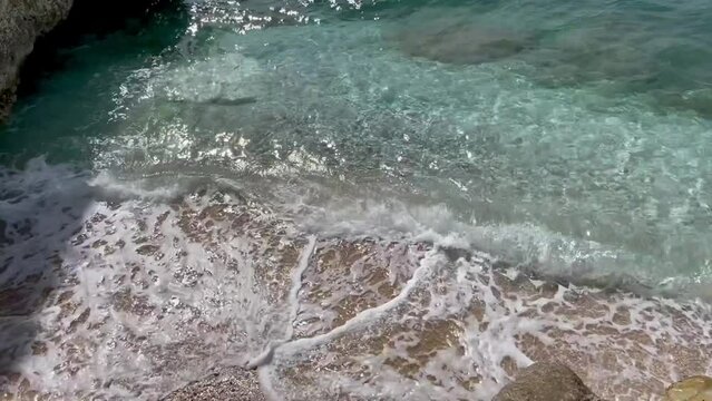Rocky beach and crystal turquoise water of Ionian 