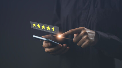 Customer use smartphone show a five star ranking best ranking. Online satisfaction surveys for...