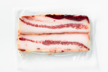 Guanciale .  Italian cured meat product prepared from pork jowl or cheeks