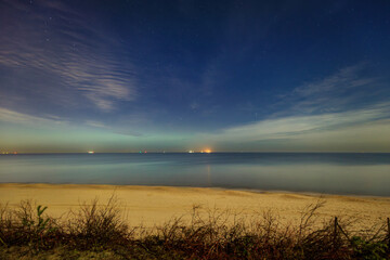 A beautiful beach of the Sobieszewo Island at the Baltic Sea at night. Poland - 768761824