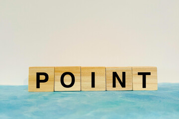 POINT word made from wooden blocks
