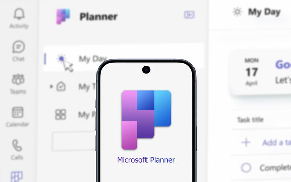 New Microsoft Planner logo is displayed on a modern smartphone, application in the background, planning application, Microsoft 365, Copilot, artificial intelligence, management, sharing, organization