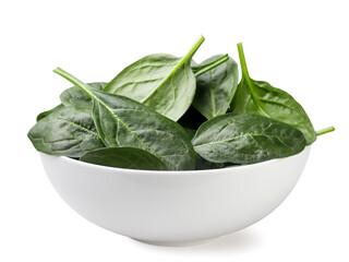 Spinach leaves in a plate close-up on a white. Isolated - 768775681