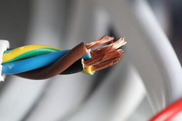 Colorful electrical wire on blurred background, closeup