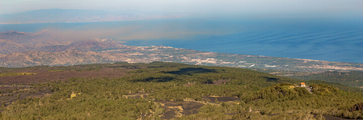 Naklejka premium Mount Etna in Italy, Sicily. Climb Etna volcano to the top. Banner Web with copy space.