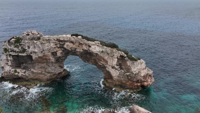 rocks in the mediterranean sea, water and calas at island of mallorca in Spain 