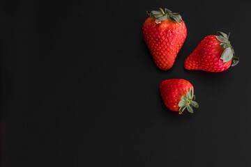 strawberries that look like they were cut into smaller pieces and placed on top of