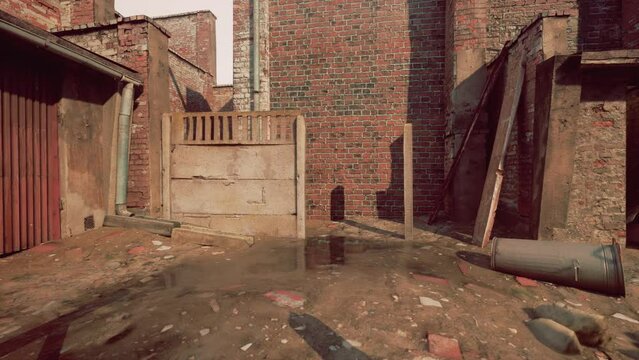 empty factory site with ruined constructions and heaps of garbage lying around