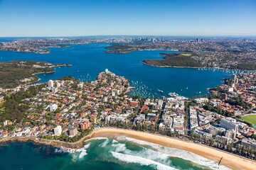 an aerial view of the city and coastline, including sydney's harbour