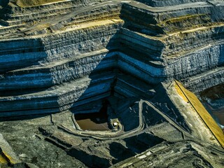 a large quarry with a water hole for coaling and loading