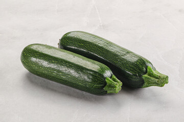 Raw green ripe zucchini vegetable