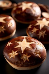 Three Chocolate Donuts With White Stars