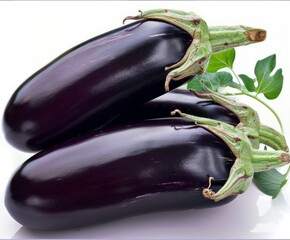 Three Eggplants With Leaves on a White Background