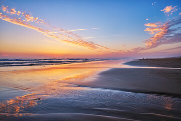 Atlantic ocean after sunset with surging waves at Fonte da Telha beach, Costa da Caparica, Portugal - 768815831