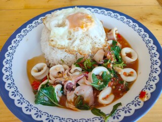 Delicious stir-fried seafood with basil