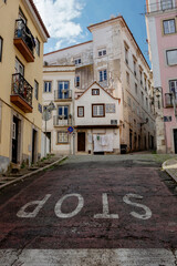 street view with old buildings in Lisbon, Portugal - 768822271
