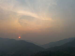 High-angle landscape Toxic dust covered Mountains and sky that are hazy at sunset