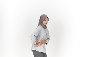 Young Asian woman wearing hijab suffering stomachache, woman period concept isolated on white background